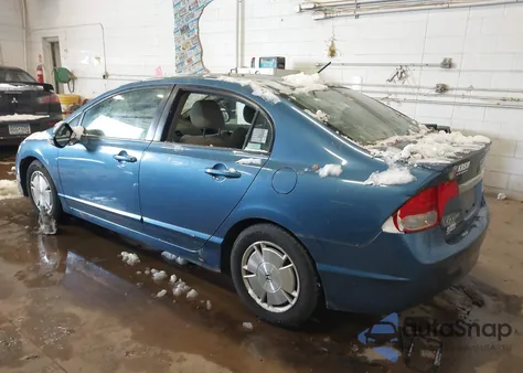 2010 Honda Civic Hybrid from USA, damaged, VIN JHMFA3F23AS004128